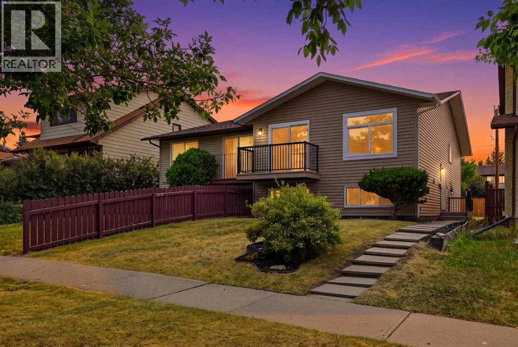 1387 Berkley Drive Nw, Calgary, Alberta  T3K 1T5 - Photo 1 - A2351106