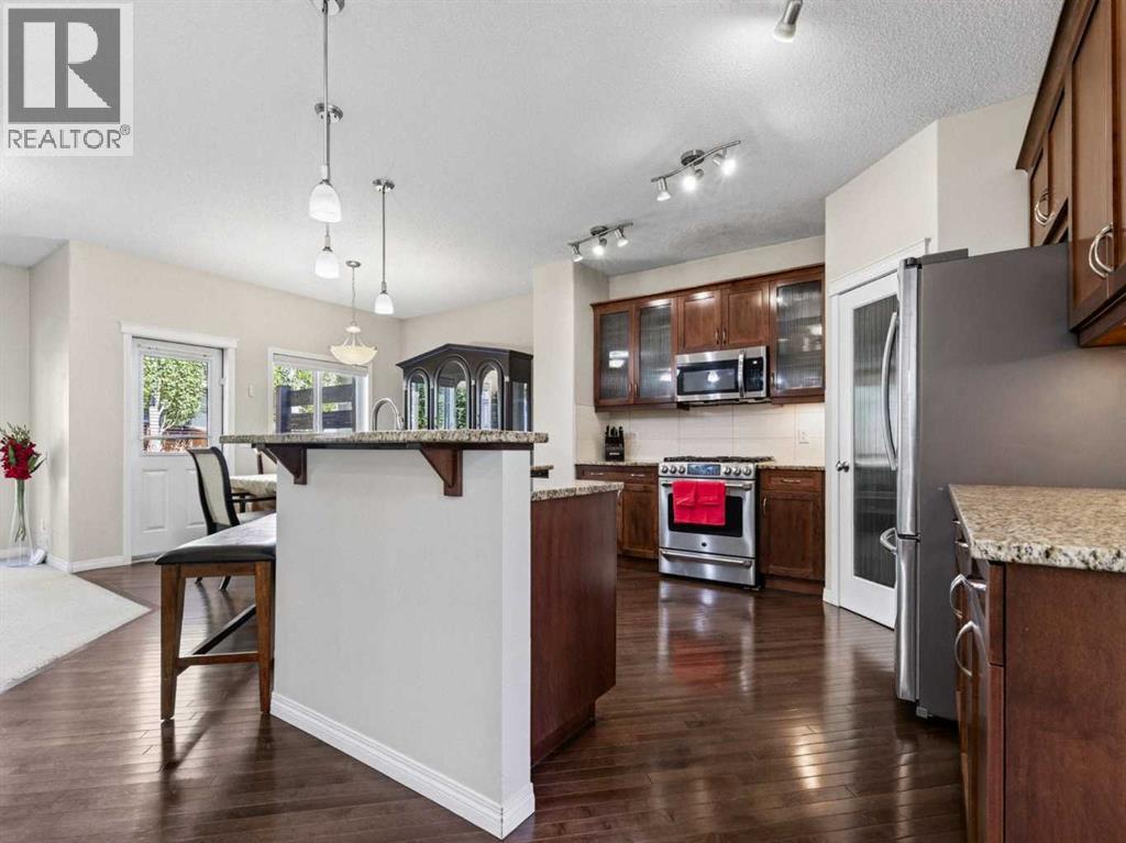 314 Reunion Heath Nw, Airdrie, Alberta  T4B 0M5 - Photo 4 - A2350452