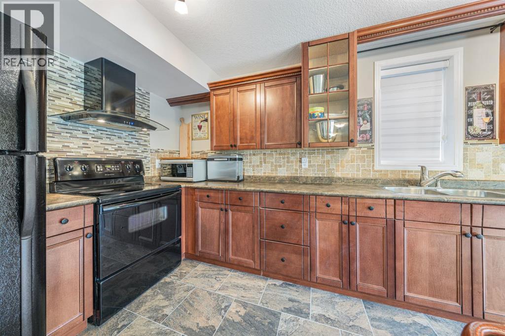 240 Everglade Circle Sw, Calgary, Alberta  T2Y 4N5 - Photo 34 - A2351224