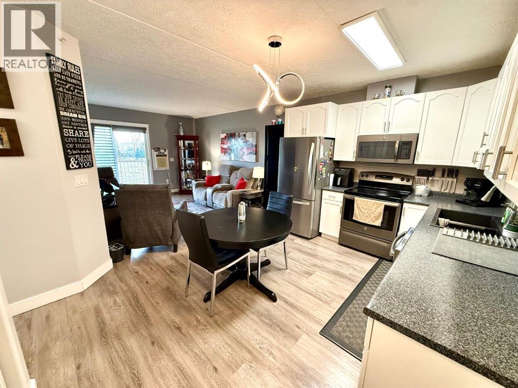 301, 400 1st Avenue Se, Diamond Valley, Alberta  T0L 0H0 - Photo 3 - A2353482