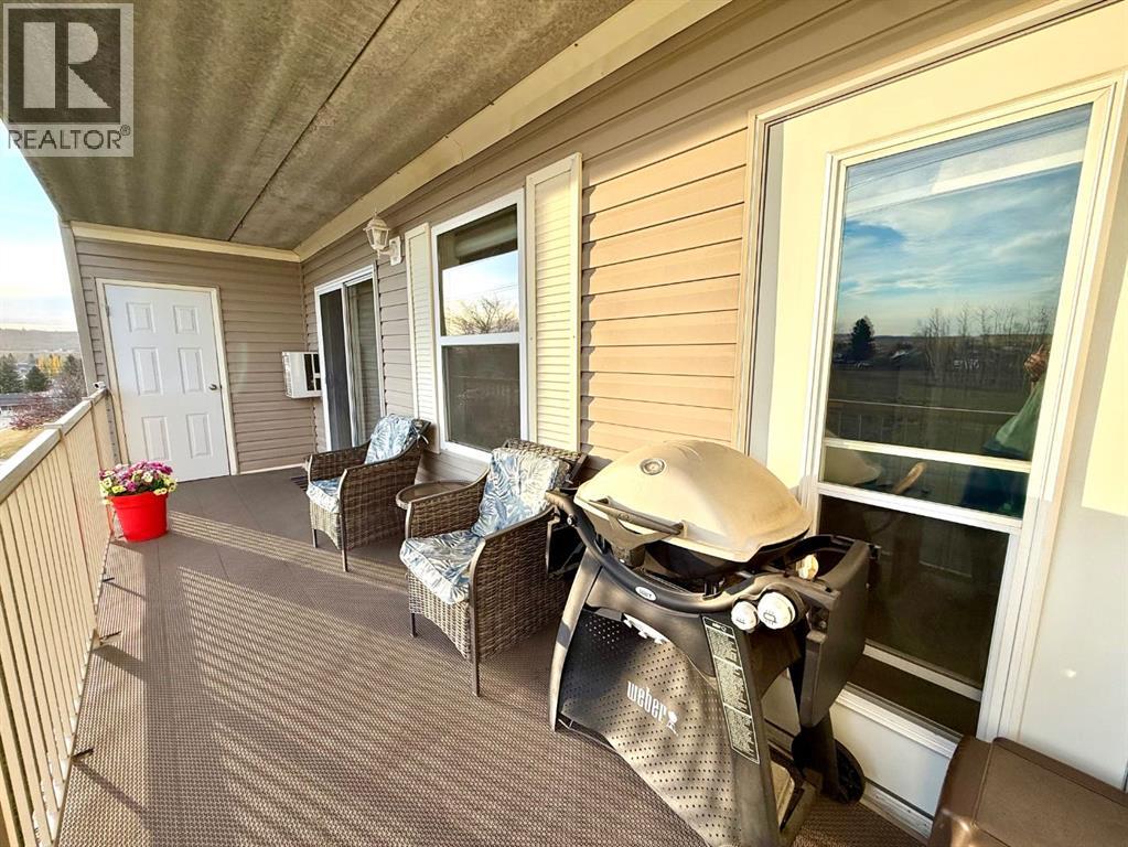 301, 400 1st Avenue Se, Diamond Valley, Alberta  T0L 0H0 - Photo 21 - A2353482