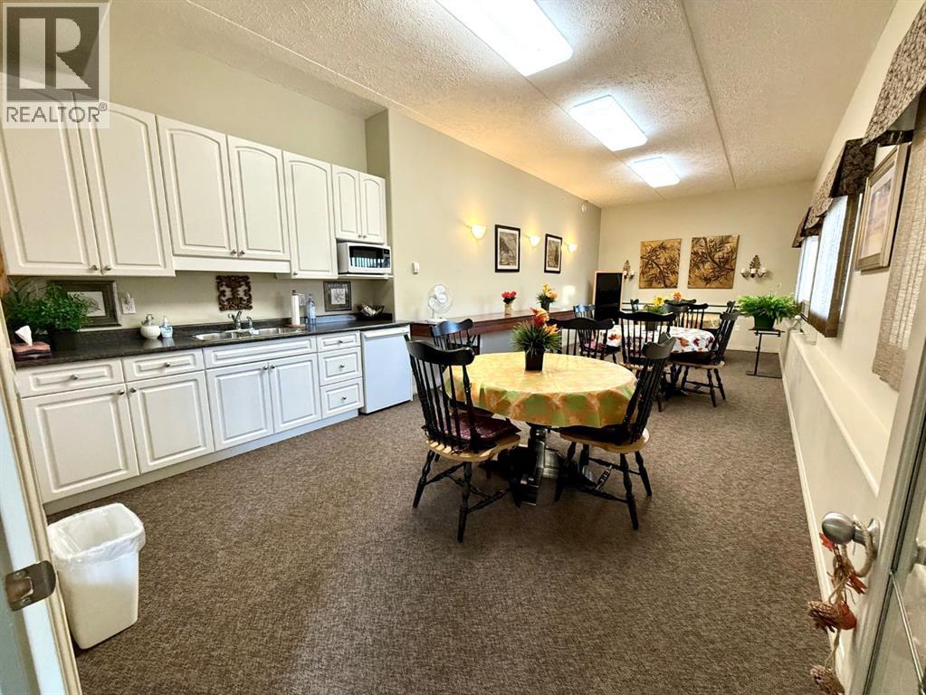 301, 400 1st Avenue Se, Diamond Valley, Alberta  T0L 0H0 - Photo 24 - A2353482