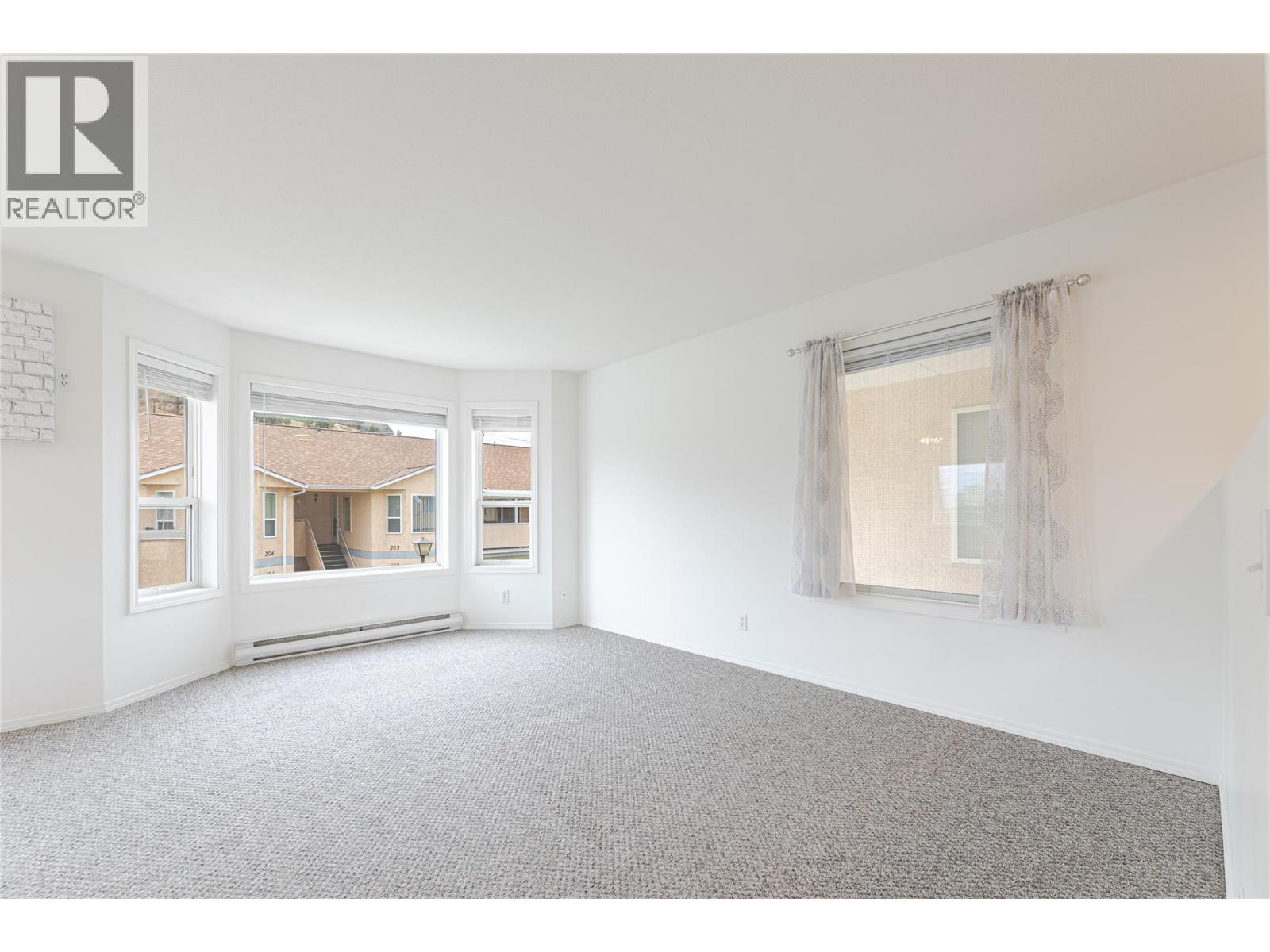 13014 ARMSTRONG Avenue Unit# 208