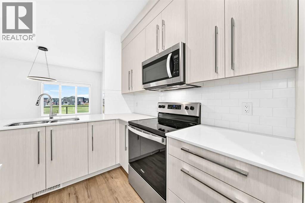 343 Creekside Boulevard Sw, Calgary, Alberta  T2X 5L1 - Photo 7 - A2350108