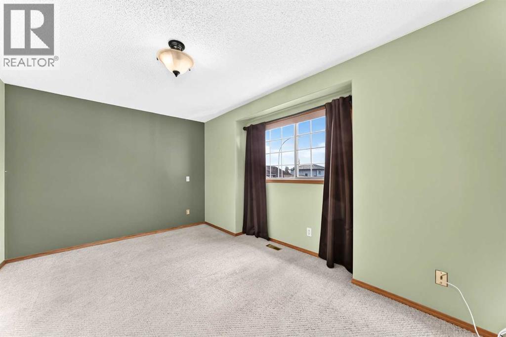 106 Elizabeth Way SE, Airdrie, Alberta  T4B 2H6 - Photo 16 - A2352089