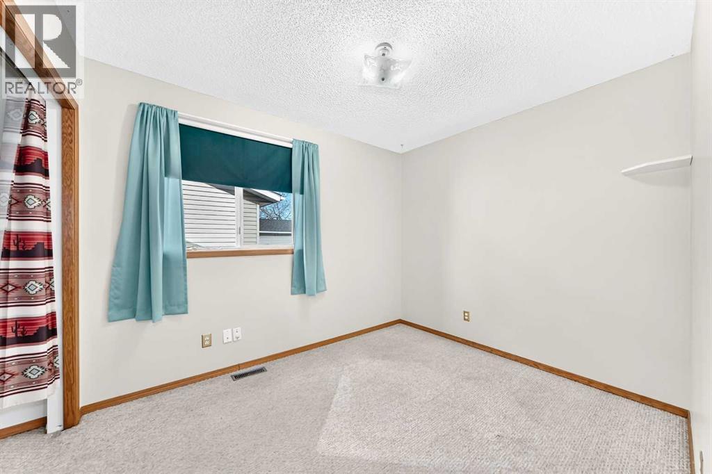 106 Elizabeth Way SE, Airdrie, Alberta  T4B 2H6 - Photo 19 - A2352089