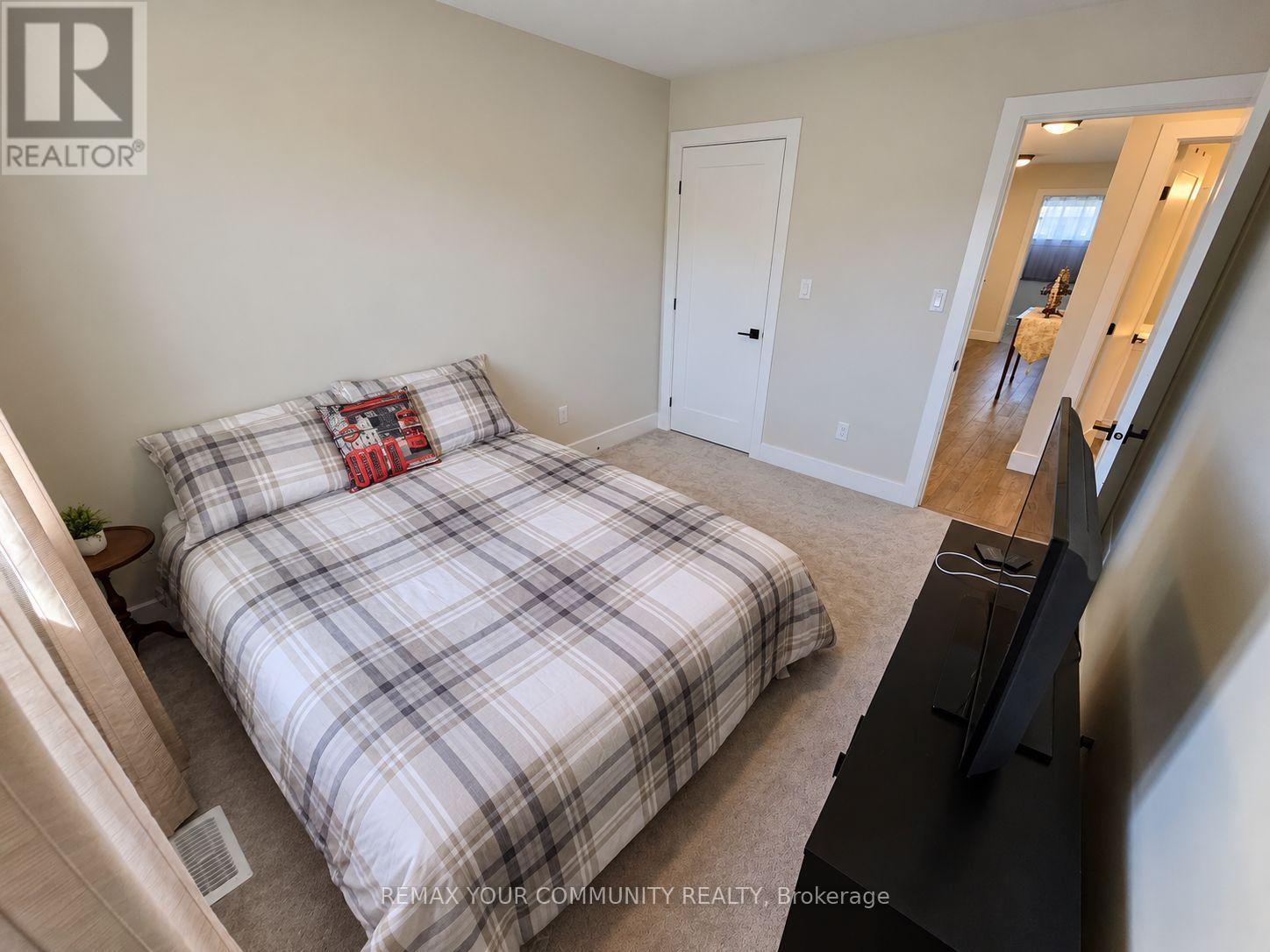 28 Dusenbury Drive, Loyalist, Ontario  K0H 2H0 - Photo 13 - X14099808