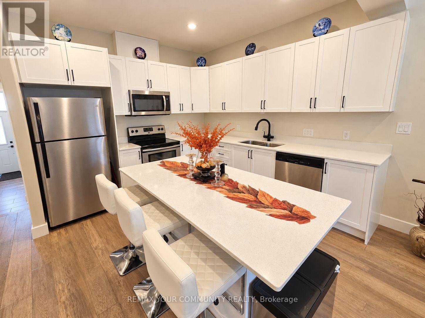 28 Dusenbury Drive, Loyalist, Ontario  K0H 2H0 - Photo 7 - X14099808