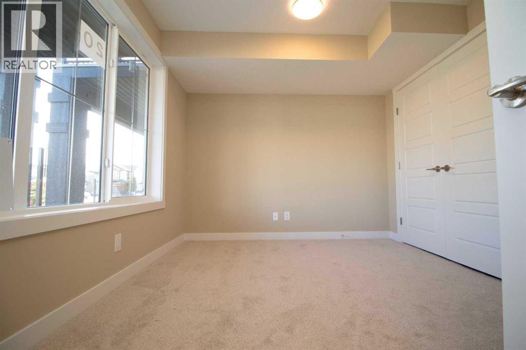 20 Sundown Place, Cochrane, Alberta  T4C 3H2 - Photo 2 - A2350109