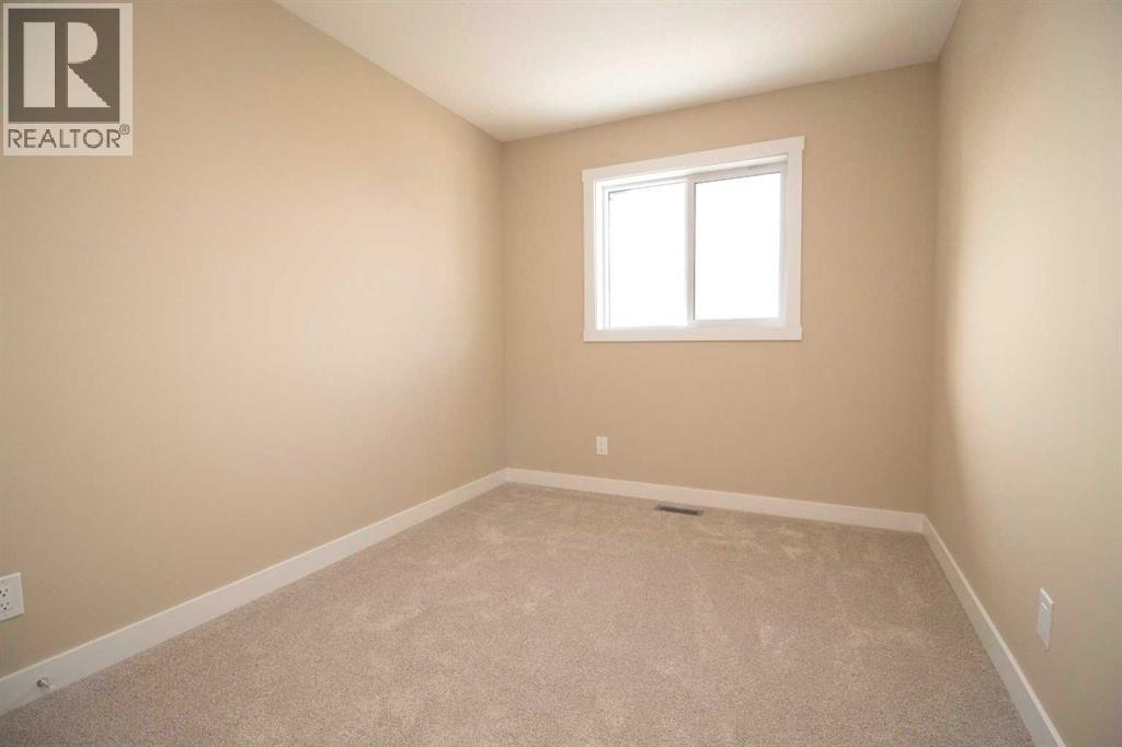 20 Sundown Place, Cochrane, Alberta  T4C 3H2 - Photo 13 - A2350109