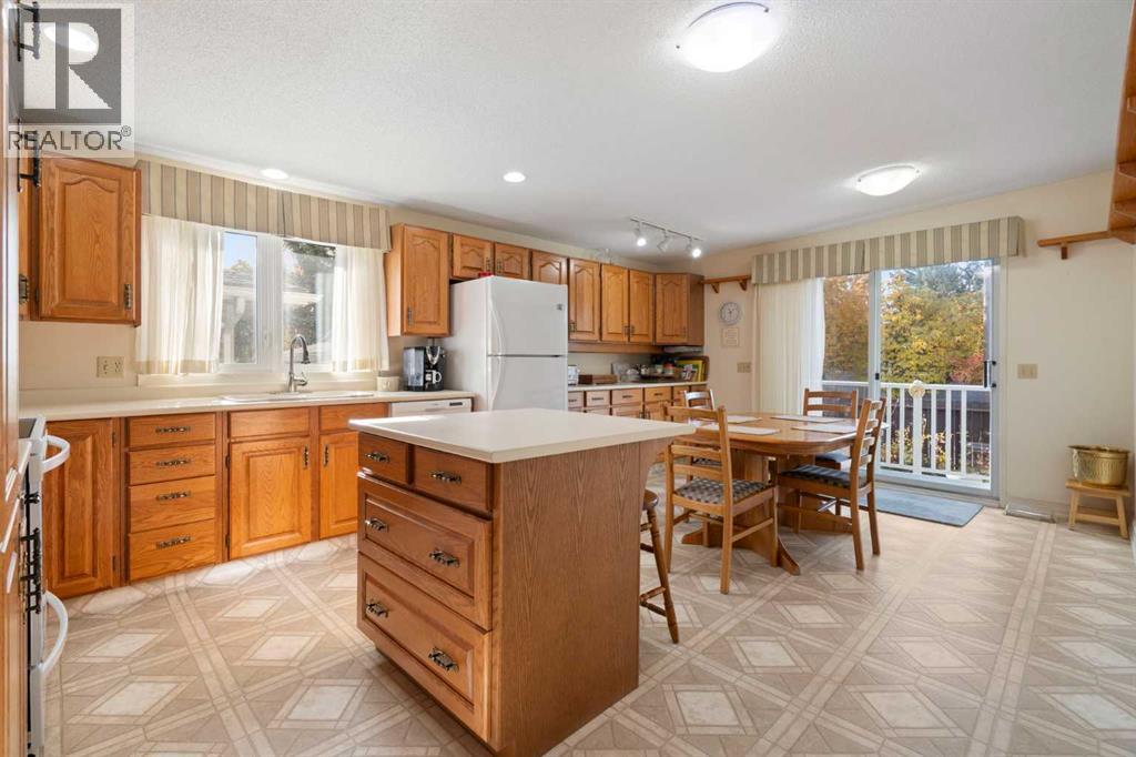 6807 Silverdale Road Nw, Calgary, Alberta  T3B 3N3 - Photo 11 - A2351415