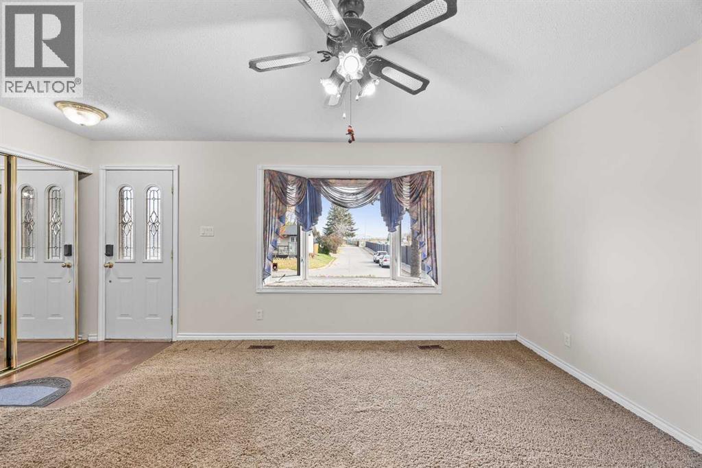 9843 Auburn Road SE, Calgary, Alberta  T2J 1C9 - Photo 5 - A2351814