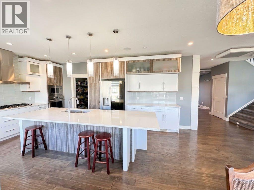 116 Kinniburgh Boulevard, Chestermere, Alberta  T1X 0M1 - Photo 11 - A2352561