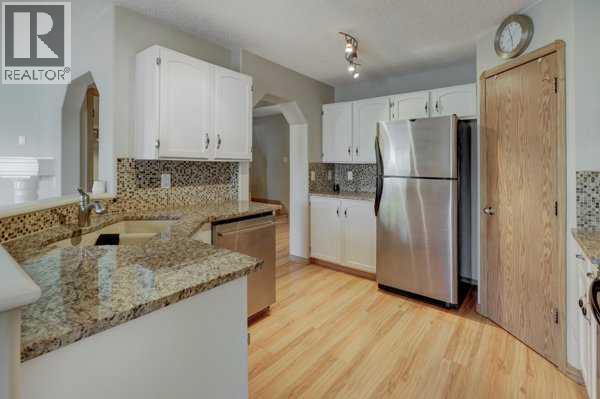 158 Saratoga Close NE, Calgary, Alberta  T1Y 7A1 - Photo 9 - A2352640