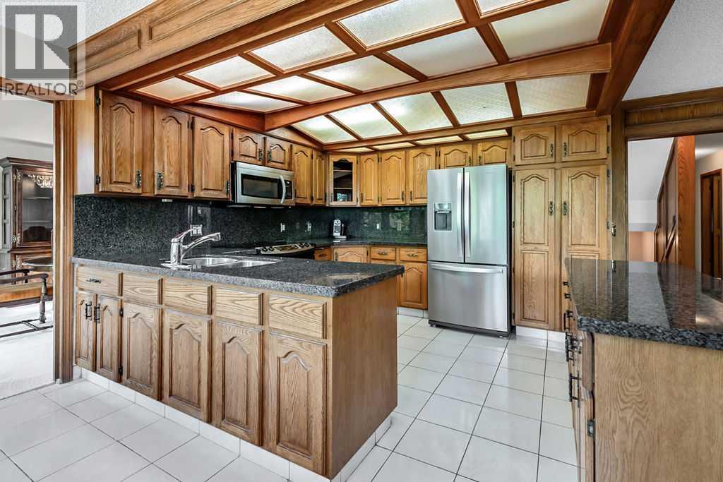56 Bernard Way NW, Calgary, Alberta  T3K 2E9 - Photo 8 - A2349994