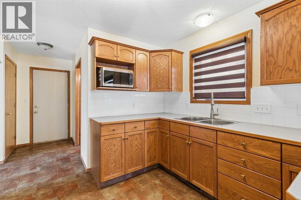 106 Hawkland Place Nw, Calgary, Alberta  T3G 3R8 - Photo 14 - A2352248
