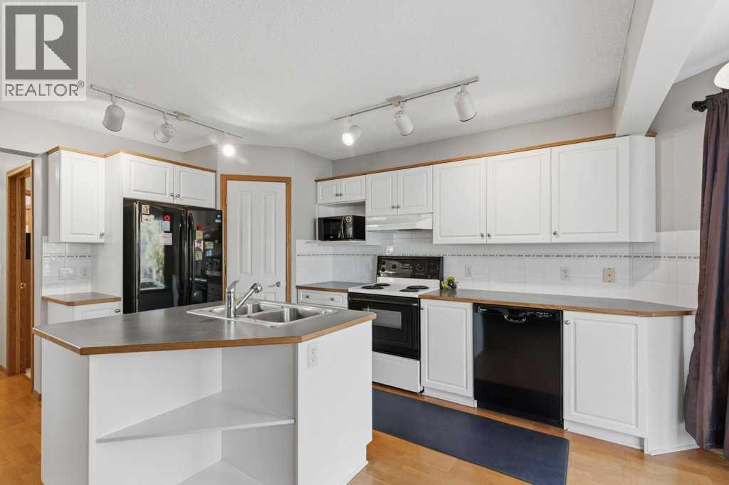 128 Douglas Ridge Close SE, Calgary, Alberta  T2Z 2M3 - Photo 11 - A2352977