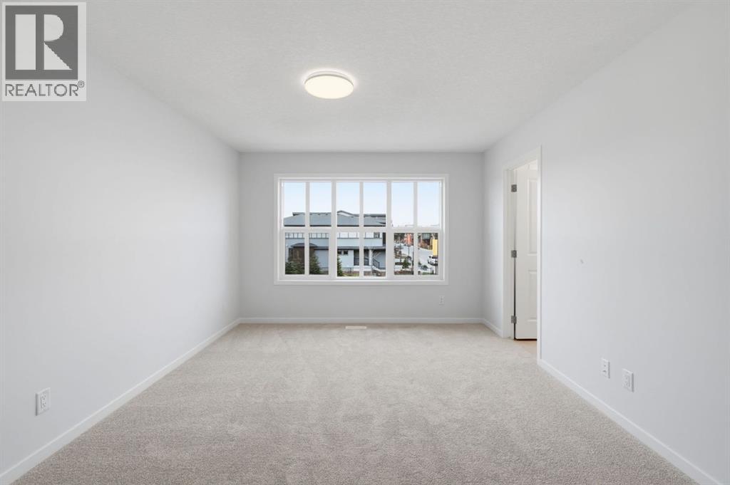 676 Rowmont Boulevard NW, Calgary, Alberta  T3L 0N5 - Photo 24 - A2353598