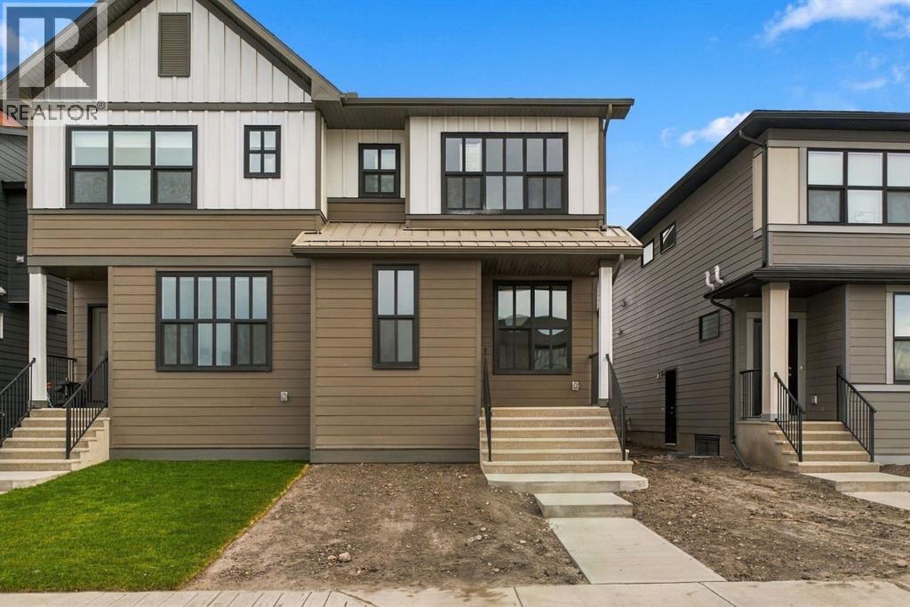 676 Rowmont Boulevard NW, Calgary, Alberta  T3L 0N5 - Photo 1 - A2353598