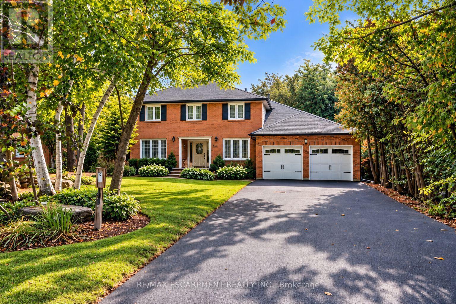 1094 Rebecca Street, Oakville, Ontario  L6L 1Y7 - Photo 1 - W14103572