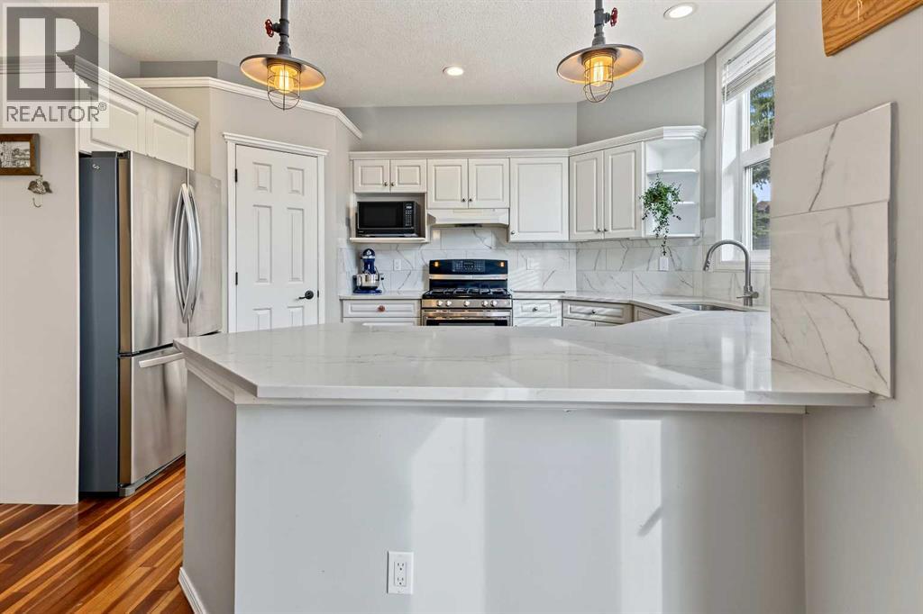 166 Rocky Ridge Green NW, Calgary, Alberta  T3G 4R6 - Photo 6 - A2353277