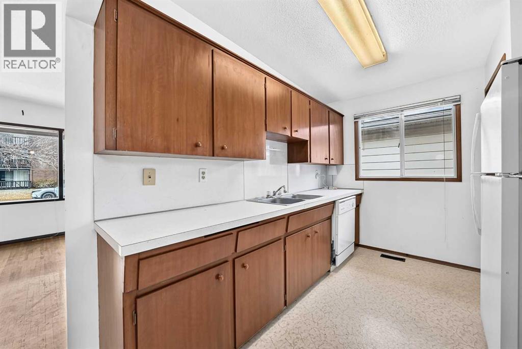 823 67 Avenue Sw, Calgary, Alberta  T2V 0M6 - Photo 6 - A2351912