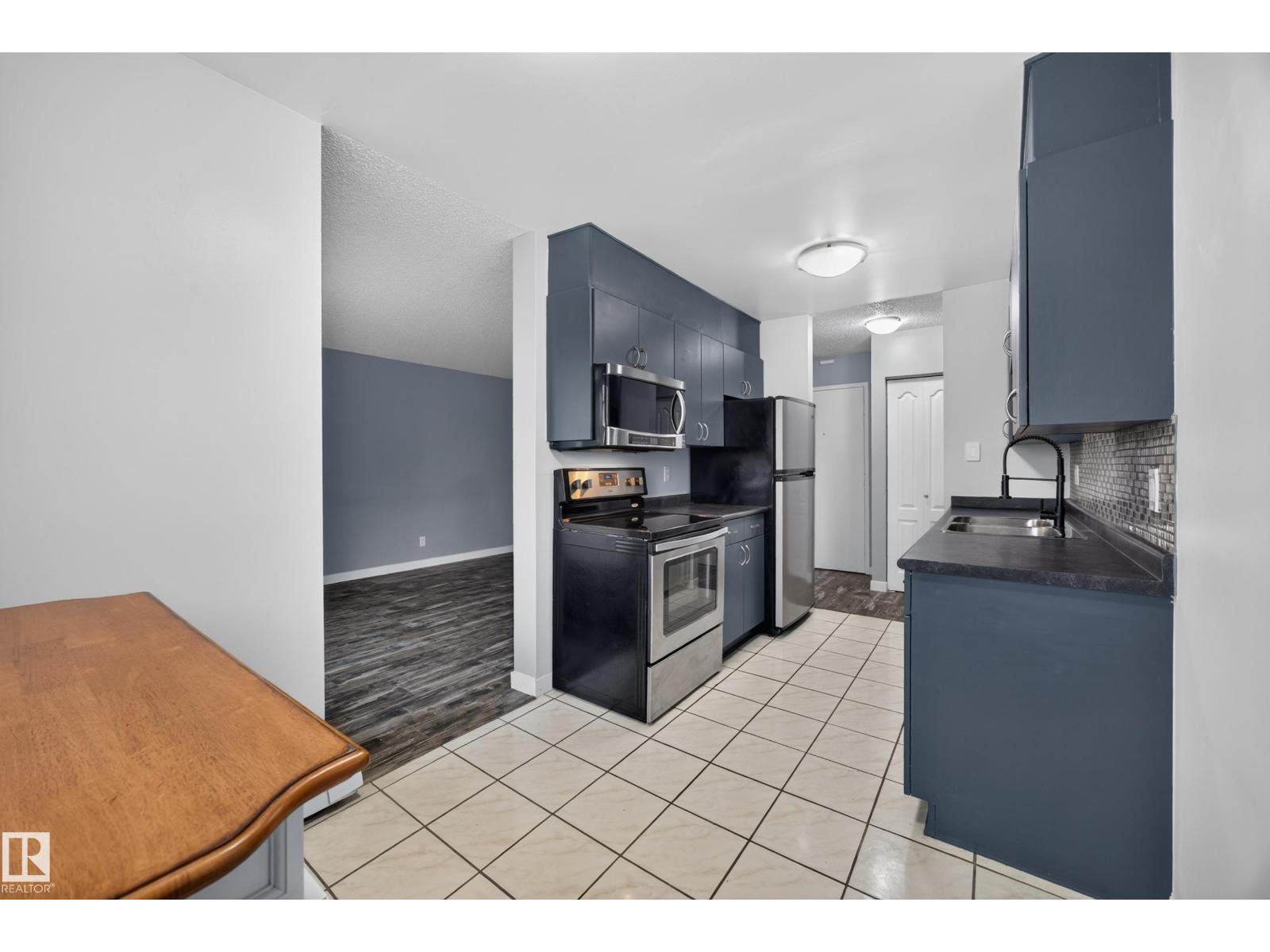 #27 11245 31 AV NW