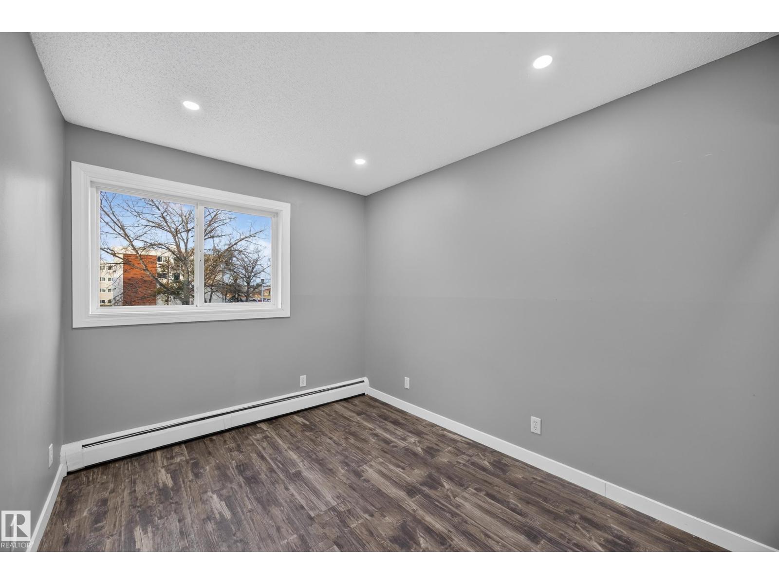 #27 11245 31 AV NW
