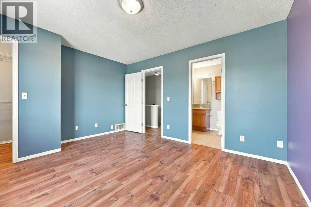 303, 2005 Luxstone Boulevard SW