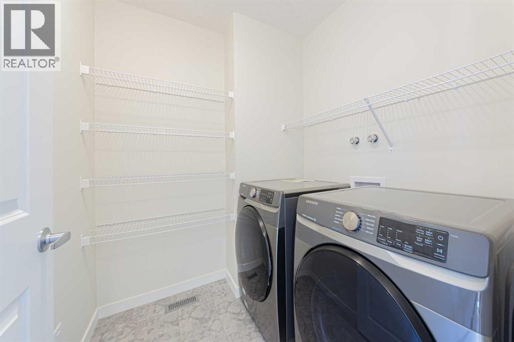 1042 Carrington Boulevard Nw, Calgary, Alberta  T3P 1L8 - Photo 19 - A2353074