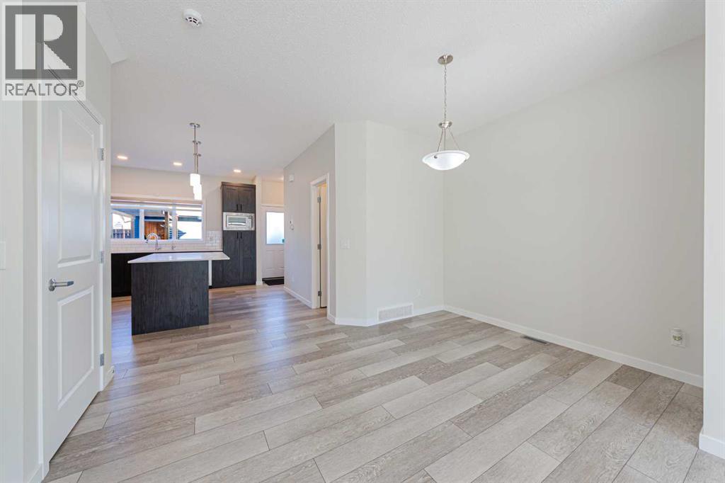 1042 Carrington Boulevard Nw, Calgary, Alberta  T3P 1L8 - Photo 6 - A2353074