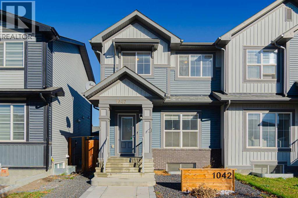 1042 Carrington Boulevard Nw, Calgary, Alberta  T3P 1L8 - Photo 1 - A2353074