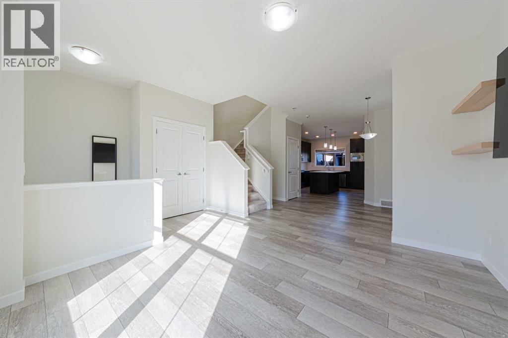 1042 Carrington Boulevard Nw, Calgary, Alberta  T3P 1L8 - Photo 4 - A2353074