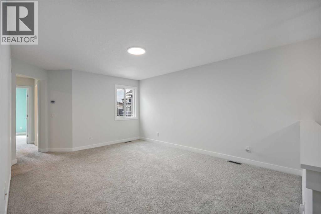 201 Creekstone Path SW, Calgary, Alberta  T2X 4Z4 - Photo 24 - A2351809