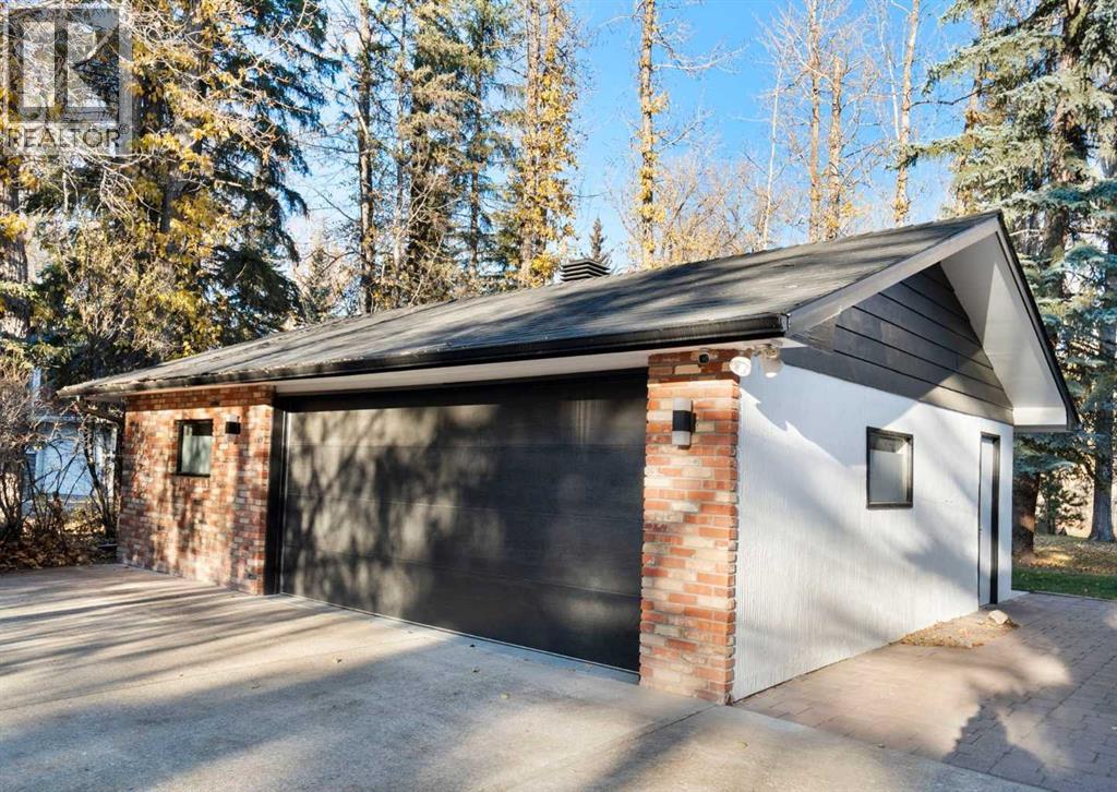 7132 Bow Crescent NW, Calgary, Alberta  T3B 2B9 - Photo 27 - A2353913