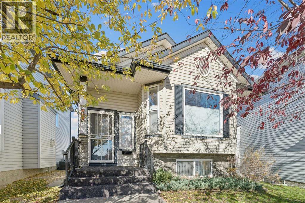 574 Evermeadow Road SW, Calgary, Alberta  T2Y 4W9 - Photo 2 - A2353167