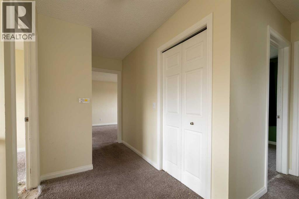 151 Bow Ridge Crescent, Cochrane, Alberta  T4C 1V2 - Photo 14 - A2351846