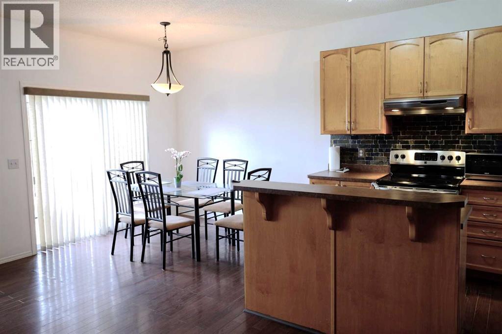 13 Tuscany Ridge Mews NW, Calgary, Alberta  T3L 3B7 - Photo 12 - A2351631