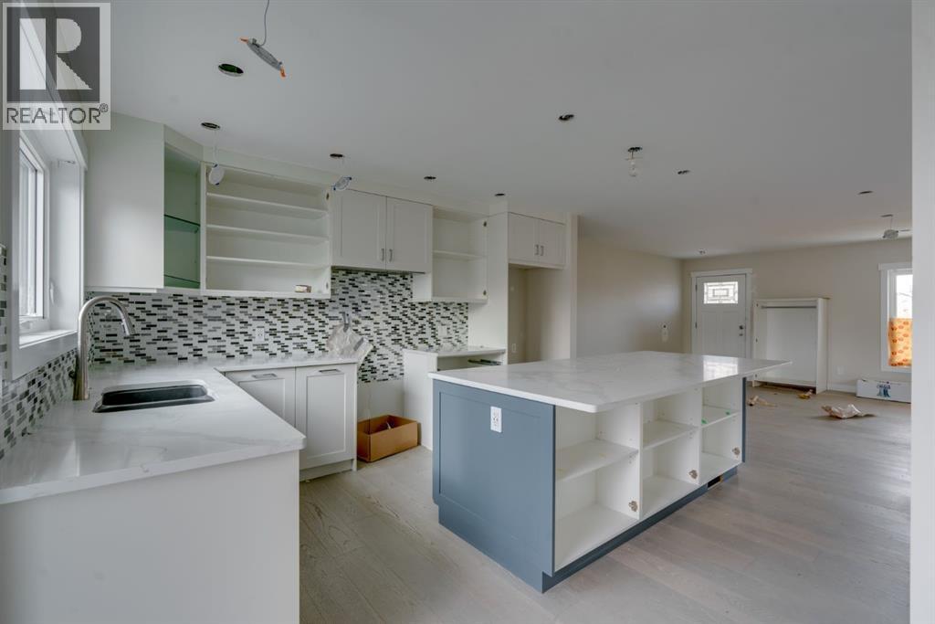 4947 10 Avenue SW, Calgary, Alberta  T3C 0M3 - Photo 9 - A2352371