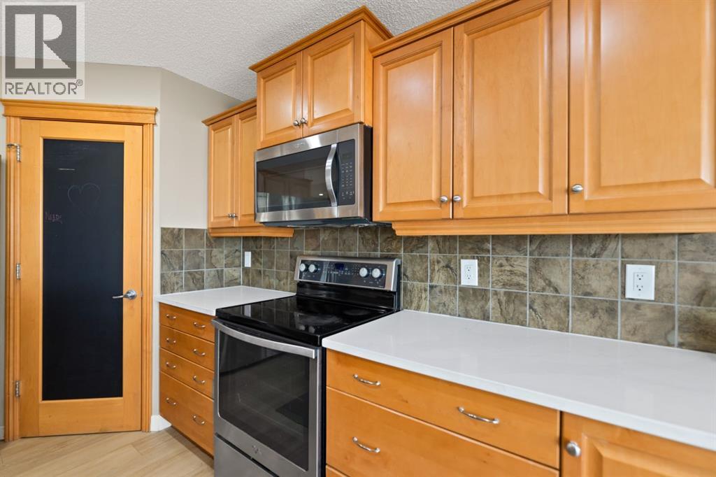 311 Sagewood Landing SW, Airdrie, Alberta  T4B 3N6 - Photo 10 - A2353897