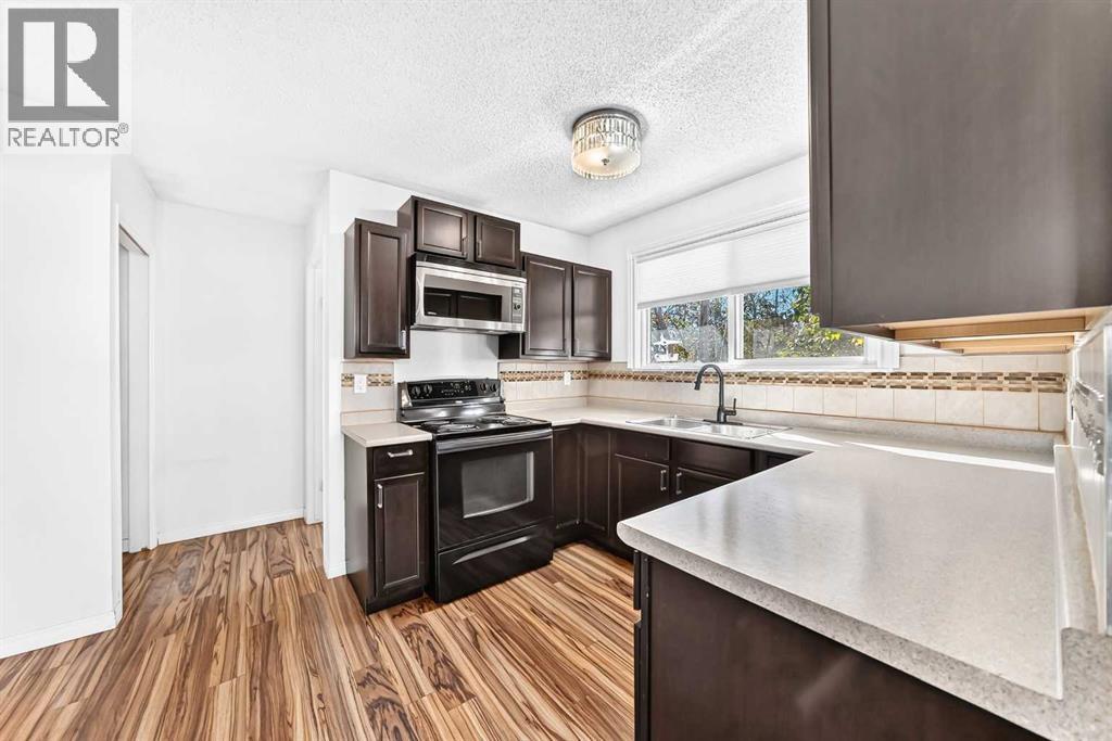 143 Deer Ridge Way SE, Calgary, Alberta  T2J 5Y7 - Photo 7 - A2350549