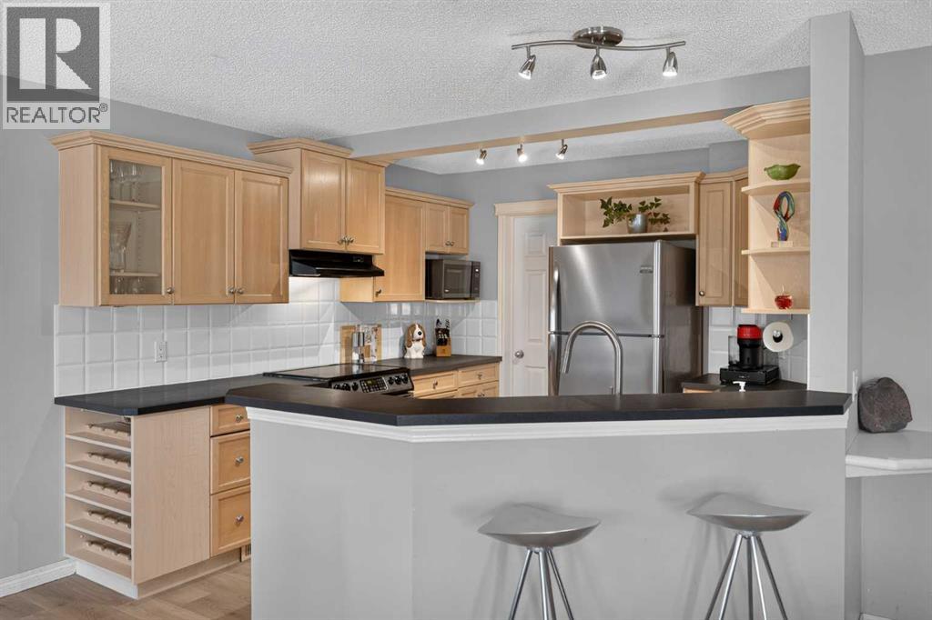 20 Chapman Court SE, Calgary, Alberta  T2X 3S6 - Photo 3 - A2352750