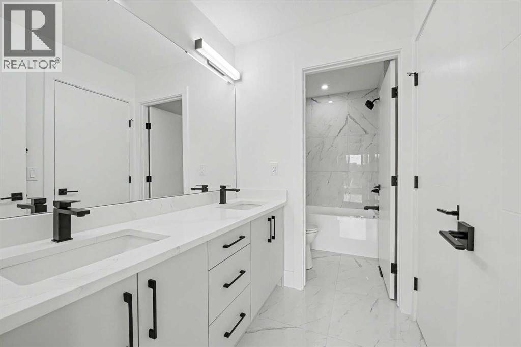 7504 Elbow Drive SW, Calgary, Alberta  T2V 1K1 - Photo 7 - A2354025