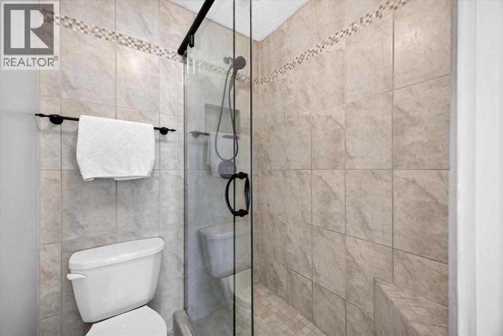 36 Lake Lucerne Close SE, Calgary, Alberta  T2J 3H8 - Photo 17 - A2352628