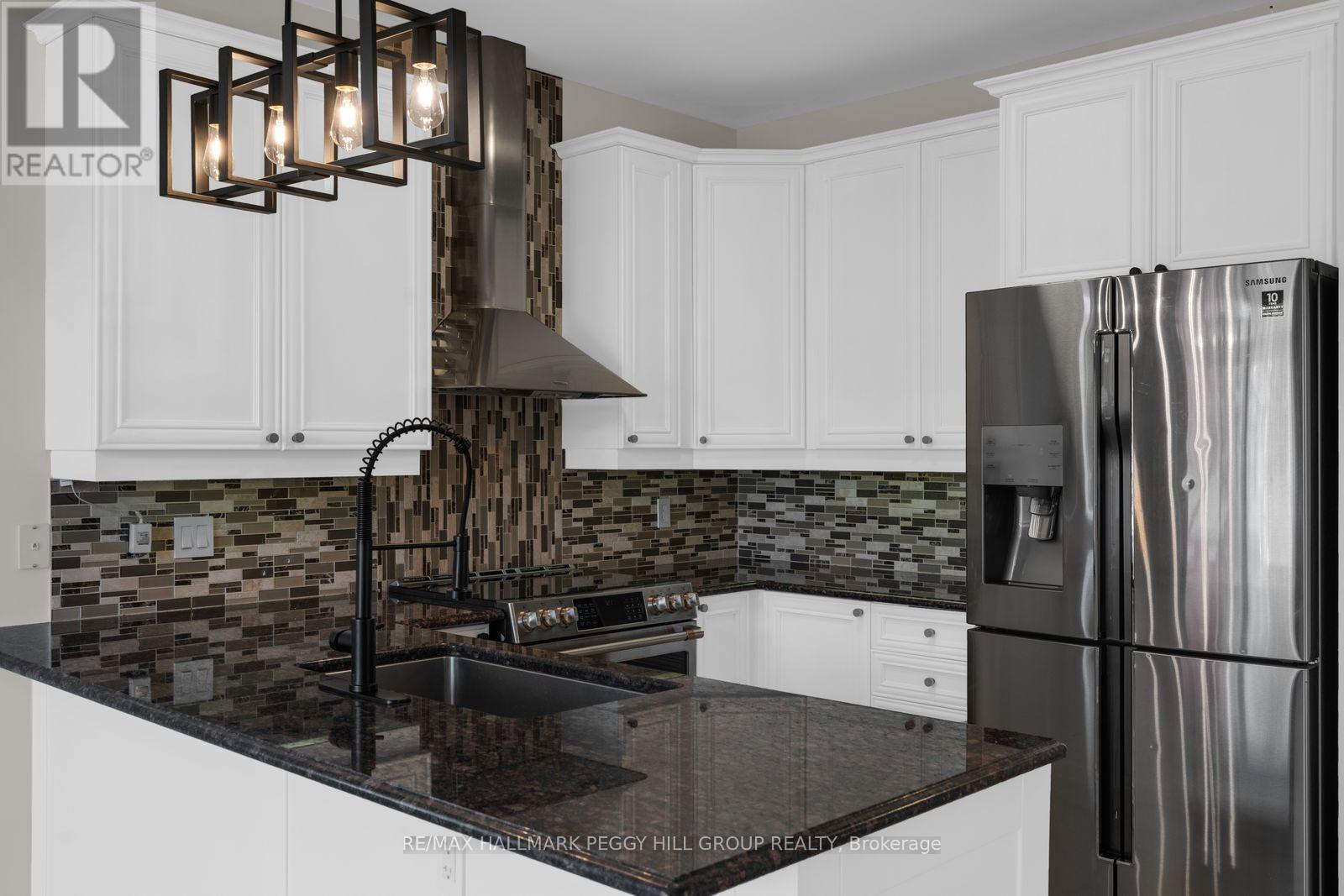 80 Monarchy Street, Barrie (Innis-Shore), Ontario  L4M 0E3 - Photo 6 - S14107246