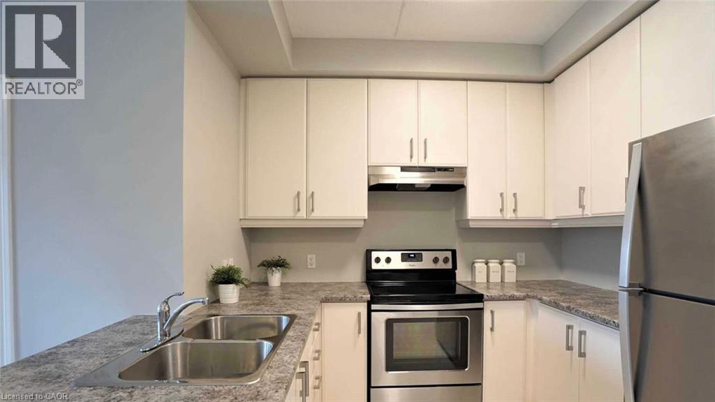 620 Sauve Street Unit# 406, Milton, Ontario  L9T 9A5 - Photo 4 - 40870544