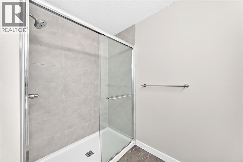 1063 Bayview Crescent SW, Airdrie, Alberta  T4B 5N8 - Photo 23 - A2338037