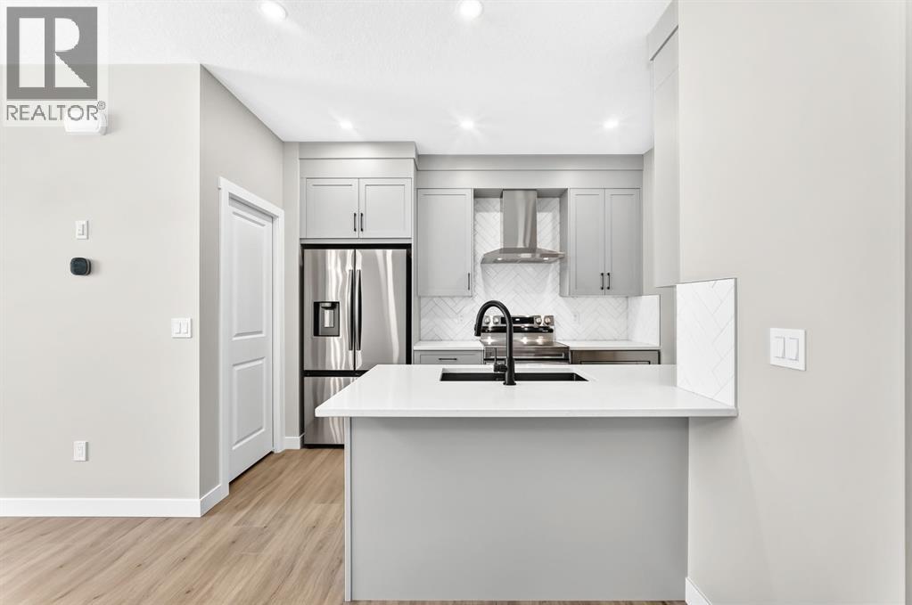 1063 Bayview Crescent SW, Airdrie, Alberta  T4B 5N8 - Photo 10 - A2338037