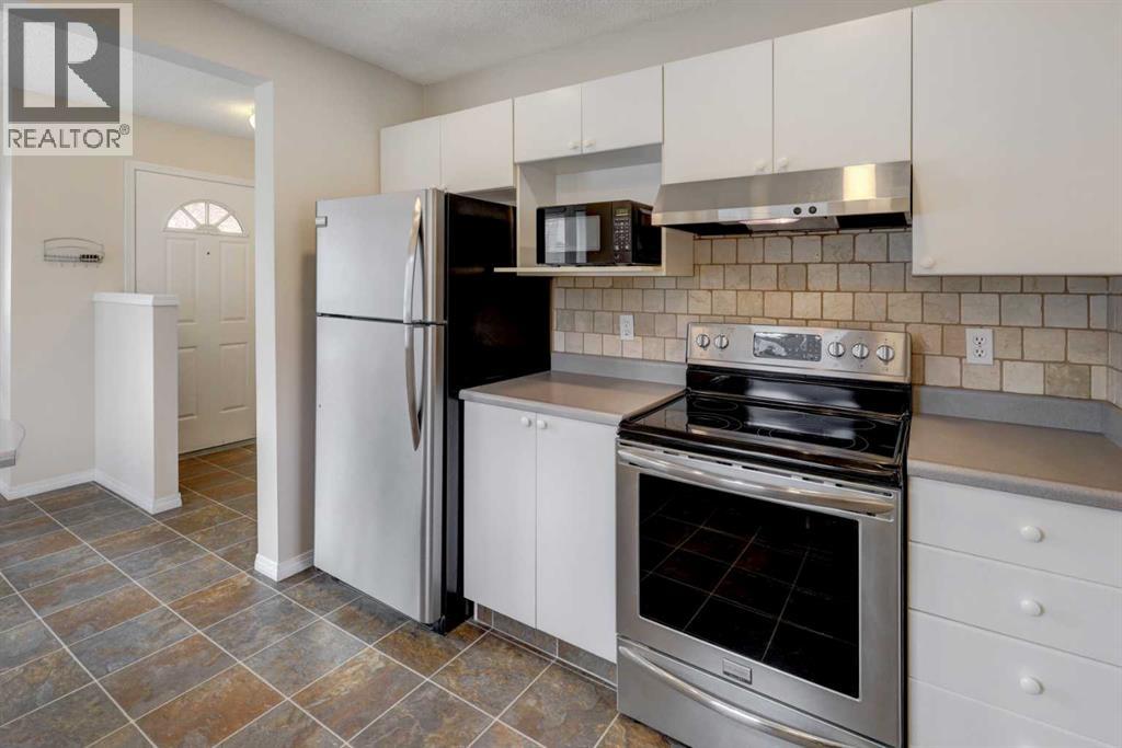 37, 388 Sandarac Drive Nw, Calgary, Alberta T3K 4E3 - Photo 6 - A2353908