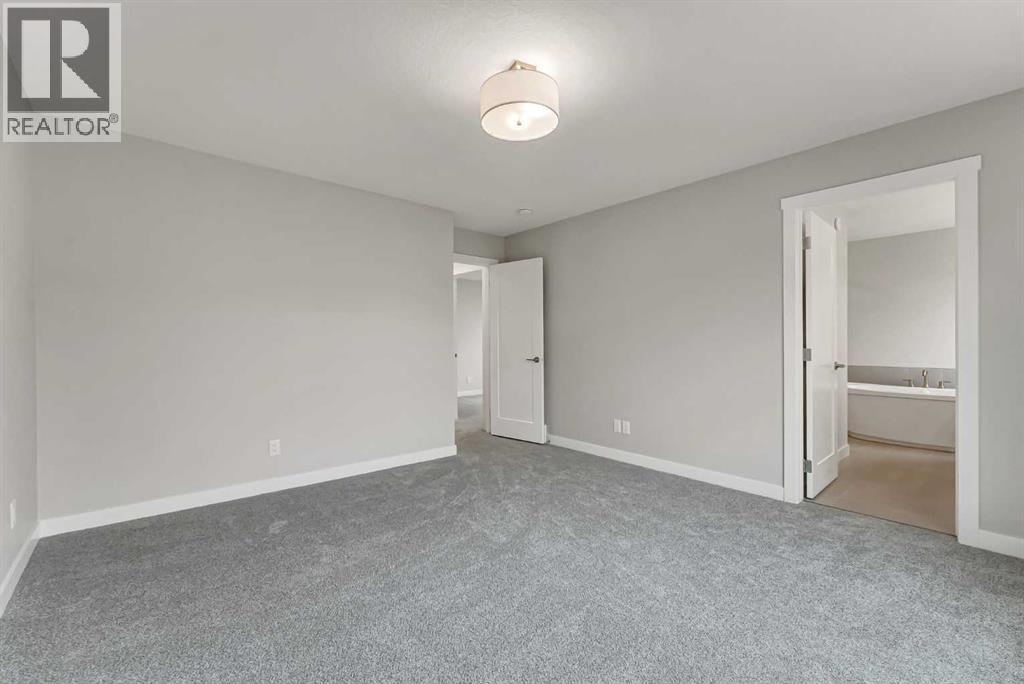 27 Creekside Rise SW, Calgary, Alberta  T2X 5V9 - Photo 26 - A2338861